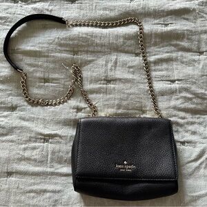Kate Spade. Black Leather Crossbody Bag with Silver toned Chain Strap